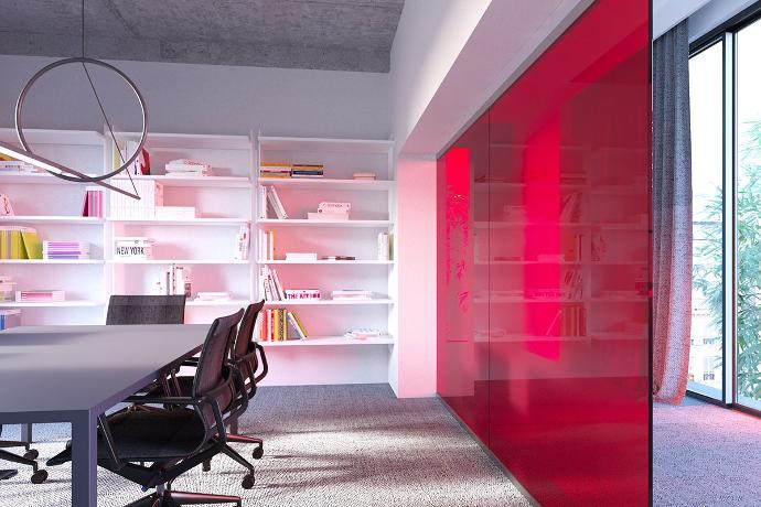 A modern office with a red transparent glass partition, office chairs, a table and shelves.