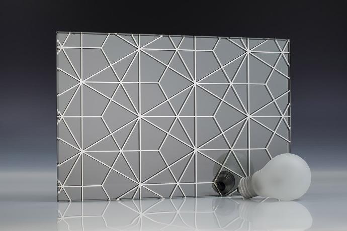 A square piece of gray mirror with a hexagon pattern and light bulbs on a neutral background